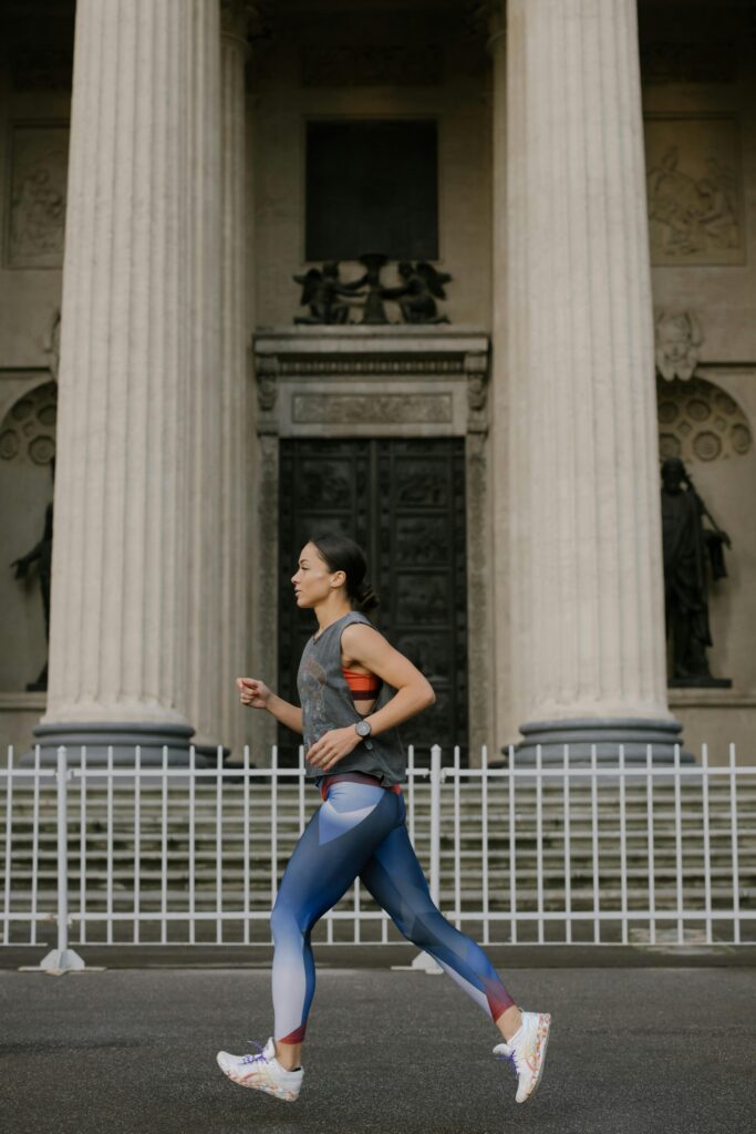 woman running in front of a government building with large pillars Therapy For Anxiety in Blaine MN