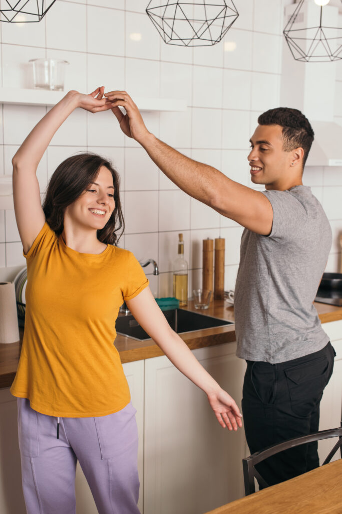Couple dancing in their kitchen. Couples therapy in blaine mn