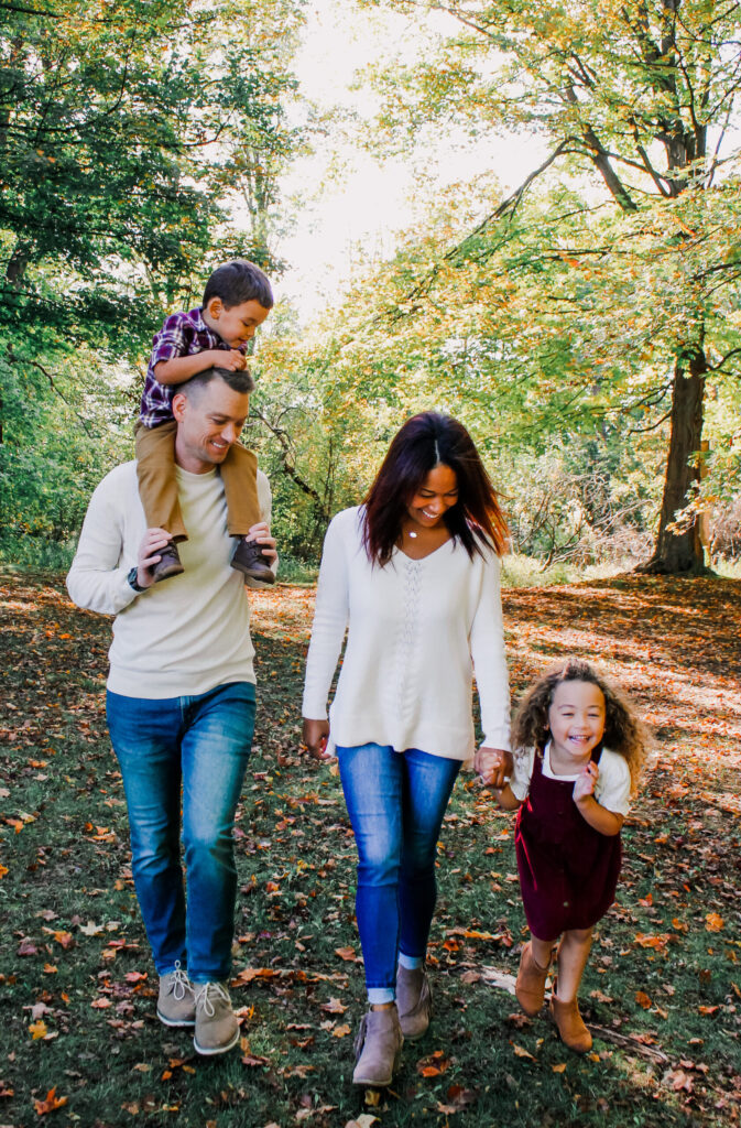 Blended Family walking outside. Therapy for parents in Blaine MN