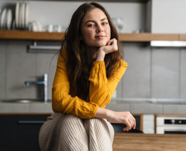 Self-Care . Young girl sitting on a counter