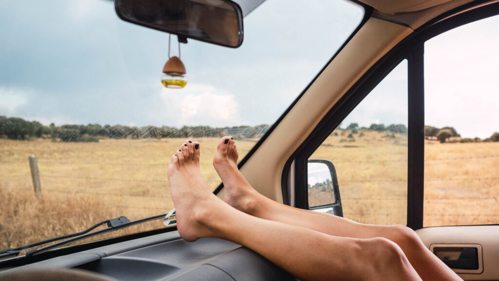 New Year's Goals Person with their feet on the dashboard