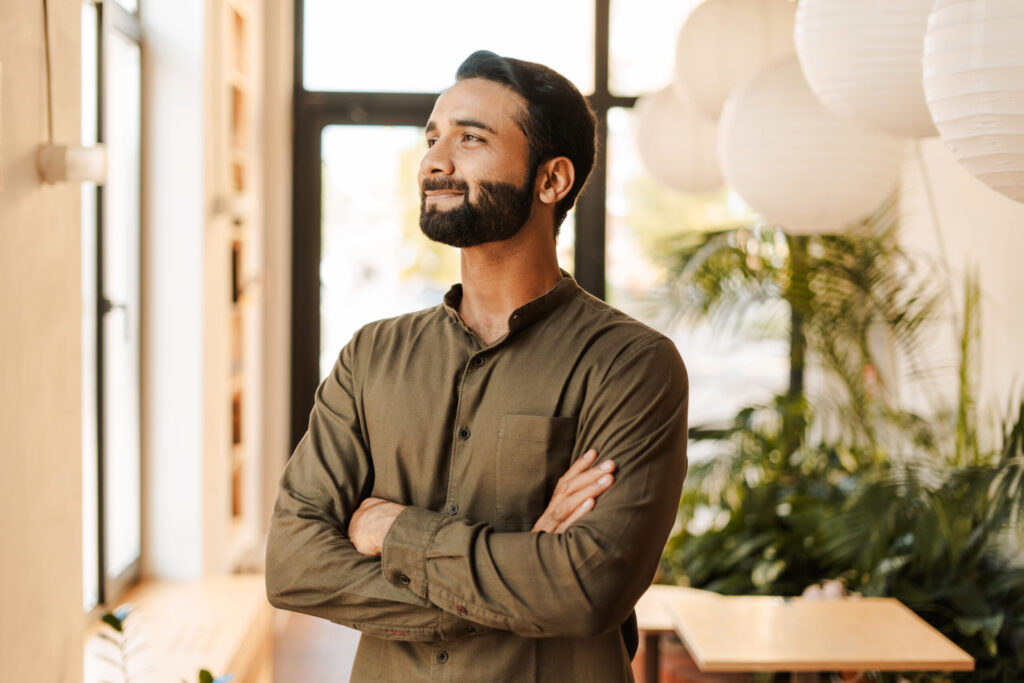 Therapy for depression in Blaine MN. Man staring out the window