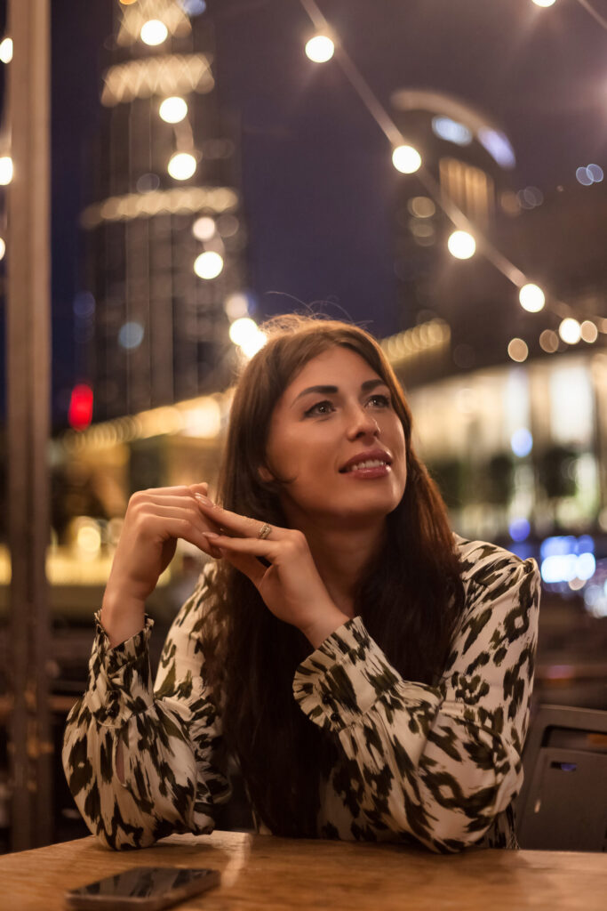 Individual Relationship Counseling in Blaine MN Woman sitting outside at dinner