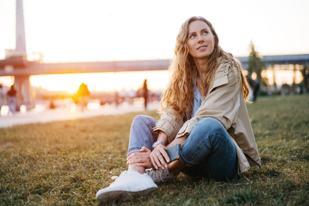 Therapy for depression in blaine mn Woman sitting in the grass