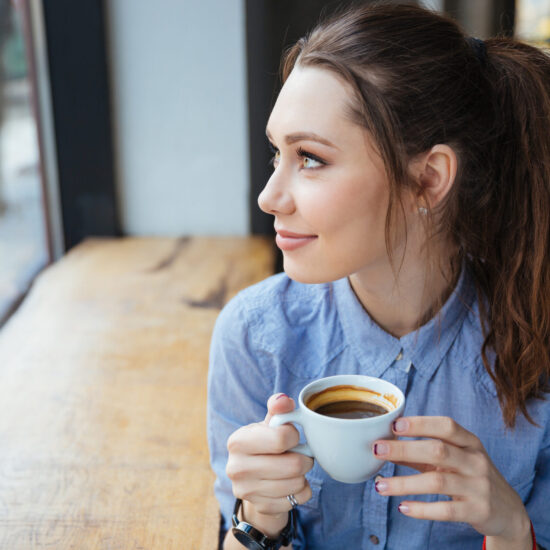 Navigating Divorce in Blaine MN Woman sipping a cup of coffee