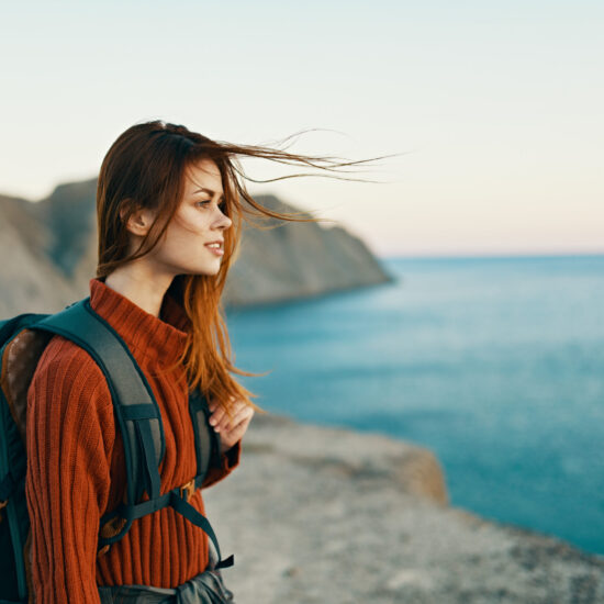 Navigating Divorce in Blaine MN Woman looking out over the sea
