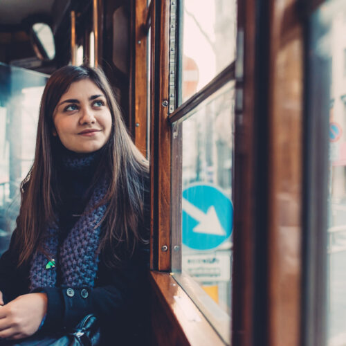 Navigating Divorce in Blaine MN Woman riding a train